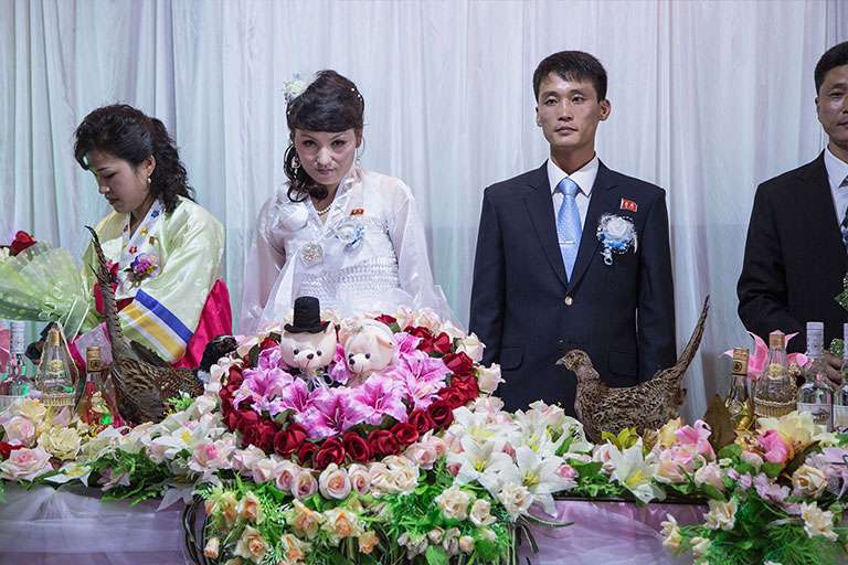 I may be struggling to find true north in this land of uncertainty, ambiguity, and doubt, but the bride’s unmistakable glare upon seeing me—a clearly unwelcome and uninvited American Imperialist with a camera in her hands—proudly earned the first spot on my “Shit I Think Might Be Real” list. Followed second by the wedding reception… I think.